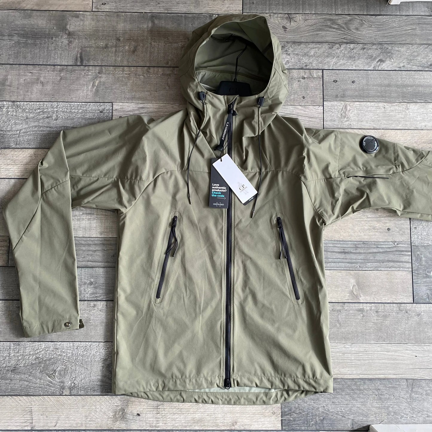 CP Company Pro-Tek Jacket Medium Lens Hooded in Green Oneworldclothing