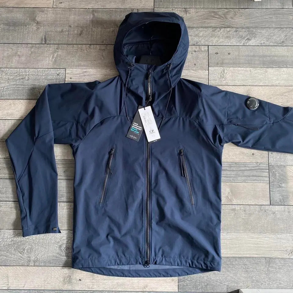 CP Company Pro-Tek Jacket Medium Lens Hooded in Total Eclipse Oneworldclothing